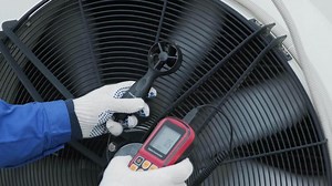 Testing with an anemometer of an axial fan of the condensing unit 5