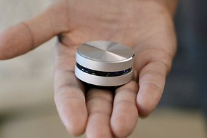 Place this puck-sized gadget on any surface to transform it into a vibrating speaker - Yanko Design