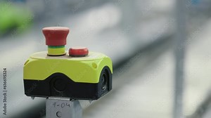Red Stop Button, Hand Reset Emergency Signal, Stopping Industrial Process. Pushing Alarm with Blinking Light, Turning It Back. E-Stop Button on Factory Production. Buzzer Press. Profuction Machine