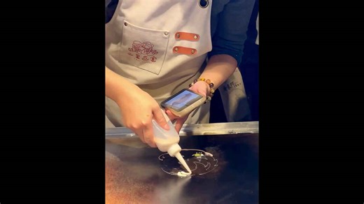 Chinese street vendor goes viral for her impressive hand-drawn cartoon pancakes