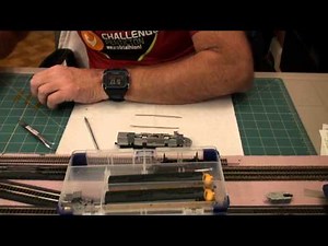 Strip down N Scale Kato E8A for conversion from dc to dcc sound.