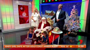 Santa Claus on Weekend Sunrise! Merry Christmas. More video: https://yhoo.it/2himBaX Video - Santa appears in Mariah video clip http://bit.ly/2hzTnSA #sun7 | Sunrise