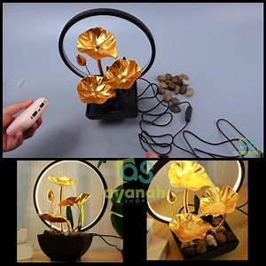 🔥 Idée cadeau tsara be 🎁 🌼 CASCADE FLEUR AVEC PIERRE NATUREL 🌼 - Une touche d’élégance et de sérénité à votre intérieur.✨ Découvrez cette magnifique lampe-fontaine décorative, un mélange parfait de design moderne et de détente. 🌿💧 Idéale pour : ✔️ Créer une ambiance apaisante avec le doux murmure de l’eau. ✔️ Illuminer subtilement votre espace grâce à son anneau lumineux élégant. ✔️ Décorer avec style votre salon, chambre ou bureau. 🌟 Caractéristiques : • Design raffiné avec des feuilles 