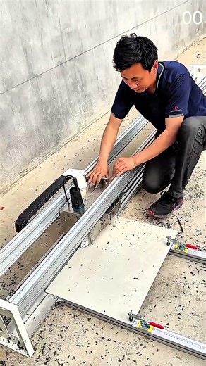 Linear milling machine slides across aluminum rails