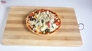 Roti Pizza Full recipe: goo.gl/i4KEfx Follow me on INSTAGRAM:: goo.gl/ByNseu | Mint's Recipes