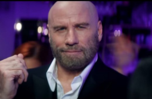John Travolta shows off his sexual dance moves in Pitbull's steamy '3 to Tango' music video