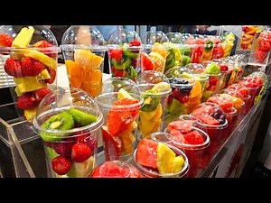 Fresh and clean watermelon, strawberry, orange, kiwi, pineapple, grape 100% fresh fruit juice