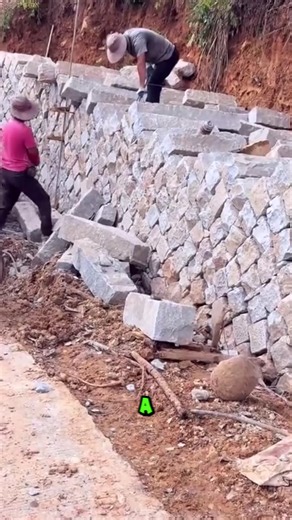 A dry-stack retaining wall holds back soil using gravity, friction, and slope. | Metzgerei Ogunquit Studio