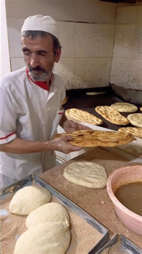 The art of baking Barbara bread by Haji Baba in Iran#shortsvideo