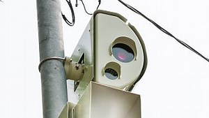 Lawsuit over red light ticketing goes back to state court