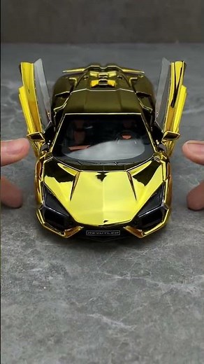 Like a golden legend descending! This Lamborghini Aventador model, complete with its own spray