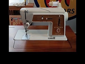 Singer Model 603E. Where is the bobbin winder??