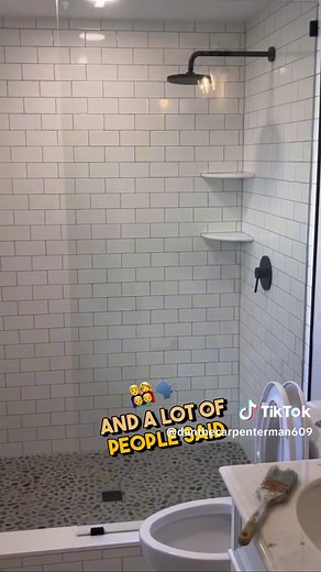 Maximizing Space in Your Bathroom: Achieve an Open Walk-Through Concept with a Rain Head Shower Do you want to create a sophisticated open-concept bathroom, but worried about water escaping? We have the perfect solution for you! Install a rain head shower with a small 3x5 shower and you won't have to worry about the water escaping! #openconceptbathroom #rainheadshower #smallshower #standardshowerhead #waterescape #interiordesign #homeimprovement #construction #constructiontips #bathroomremodel