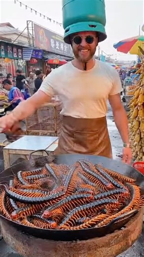 an american man selling centipede dishes at an extreme market #shorts
