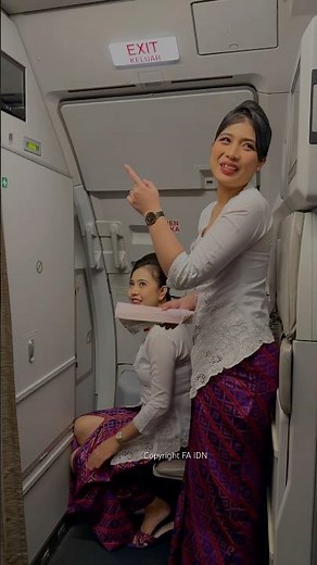 Batik Air Flight Attendants Prepare to Open the Plane Door