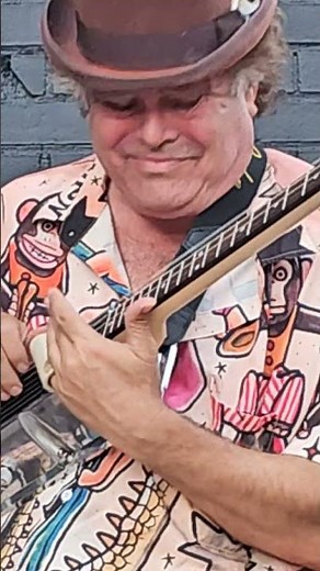 How to play Blues Slide On A 4 String Guitar Made From A Edelbrock Valve Cover