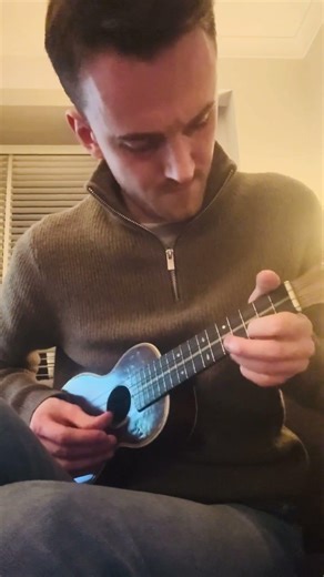 The Beatles - Something guitar solo, played on a ukulele.