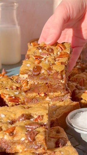 My Brown Butter Blondies are thick & chewy, with incredible depth of flavor from dark brown sugar & toasty brown butter. They’re studded with melty chocolate chips & crunchy bites of toasted pecans! #chocolatechip #BakingJoy #dessertrecipe #easyrecipe | Blue Bowl