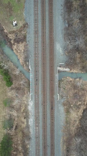 3.4K views · 279 reactions | Eastbound NS intermodal 29G with 5 units meets up with a westbound 3 unit manifest 12N over Cedar Creek on the busy Chicago Line in Northwood, Ohio. #reelsvideo #reelsfb #train #railroad #railway #drone #video | Craig Hensley Photography | Facebook