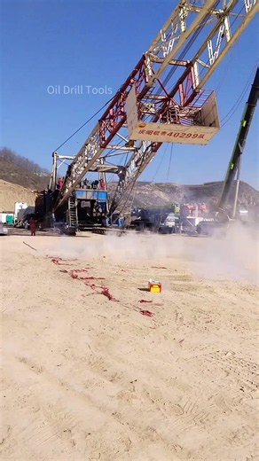 Oil drilling lifting derrick; drilling workers at the new well site #oilfieldservices #petroleum #oilman #oilwell #drilling