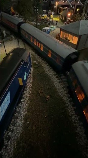 Class 47 pulling The Coronation Scot past the signal box.