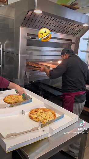 Pizza Preparation in a Commercial Kitchen Setting