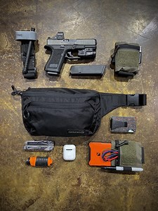 Where does it all fit? The Bando XL has ample room in all 3 pockets. The secondary pocket has more compartments for smaller items or can be used for a couple of bulkier options, as shown here. Tap the link in our bio to see and learn more about our NEW Bando XL. #eberlestock #ccw #edc #fannypack | Eberlestock