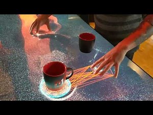 MultiTaction Touchscreen Table - Tracking and Particle System Demo