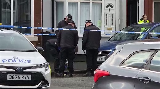 Police inspecting a drain at scene in Winson Green