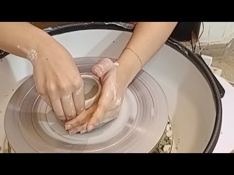 Student wheel throwing beginner work