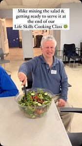 Mike puts the final touch on a delicious fresh salad at our Life Skills Cooking Class, where individuals in our Day Programs learn healthy recipes, meal prep techniques, and kitchen skills—from chopping fresh fruits and veggies to setting the table and serving a meal. These hands-on experiences are more than just fun and engaging—they empower confidence, independence, and valuable life skills. A huge thank you to our dedicated staff and volunteers for making these classes possible! ❤️ | Cape Abi
