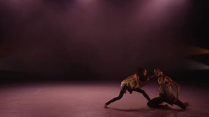 Alvin Ailey American Dance Theater dancer Jamar Roberts makes his Ailey II choreographic debut with his work 'Gêmeos' (Portuguese for twins). Loosely based on the relationship of Roberts and his brother growing up as children – one a dancer, the other an athlete – Roberts illustrates the dynamic between contrasting personalities and how they evolve from hostility to harmony. Using music with heavy percussion, brassy horns, groovy bass guitar, and the commanding singing style of Afrobeat star Fel