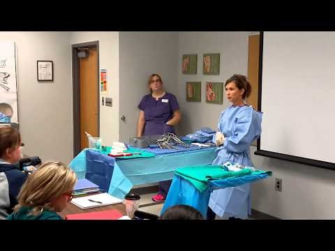 2 Setting up back table and mayo stand