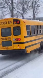 After a Night of Heavy Snow — A School Bus Journey to Remember ❄️🚌 Description: After a long night of heavy snowfall, the roads are covered in thick white layers. Morning arrives, and the school bus is already running late. Parents watch anxiously as the bright yellow bus carefully moves through icy streets. Snow piles line the sidewalks, tires crunch against frozen roads, and every turn requires patience and skill. Inside, children sit quietly, looking out the frosted windows at a winter wonde