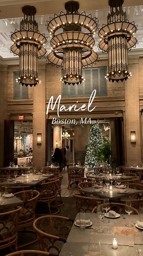 Elizabeth | Food & Travel on Instagram: "A great date night spot in Boston! Mariel is a Cuban restaurant serving curated cocktails, delicious food and has the best vibes. Menu highlights include the matanzas mojito with papaya, their fufu gnocchi, and spicy feta pizza. For dessert, I recommend the coffee and doughnuts with cuban coffee cheesecake and hot rum doughnuts! @marielofficial 10 Post Office Square Boston, MA #mariel #marielboston #boston #cubanrestaurant #bostonfoodie #foodblogger"