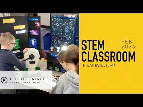 STEM Classroom Students learning about energy with a hand crank generator and light bulb display