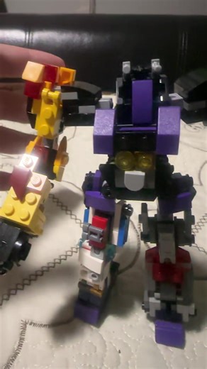 My Lego transformers Animated Stuntacons as menasor (the Arcee, Optimus, Rodimus, Blurr and Jazz molds where made by Stutopian Studios on YouTube)