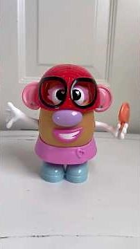 Taking Mrs.Potato Head apart with Spider-Man mask of