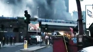 Helicopter crashes into crane on London tower, kills two