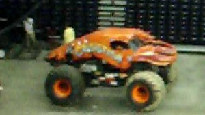 Announcer gets hit by monster truck.MOV