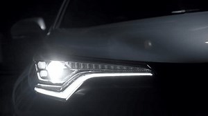 clip-1100942867-driver-start-engine-drive-car-traffic-turn