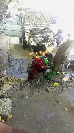 Car Restoration Process: Working on a Disassembled Vehicle