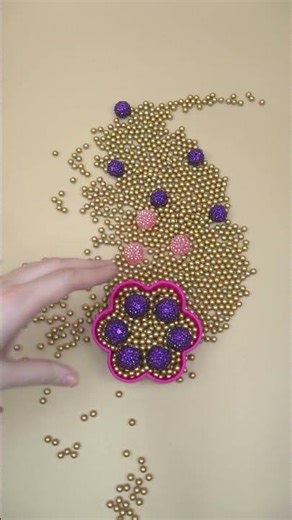 Mesmerizing Bead Cascade 🖤✨💛#reverse #beads