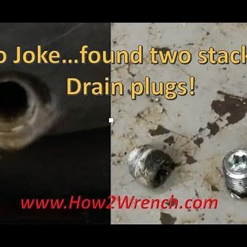 WTH??? Two drain plugs in my Harley Davidson primary cover??? Check this out!