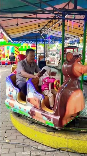 Ride the brown bear train accompanied by a cute and exciting father