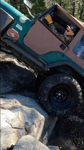 Old school spring over CJ on Iroks climbing up Driveline Hill! #jeep #offroad #4x4