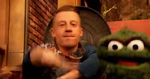 Watch: Macklemore Gets An AMAZING Sesame Street Cover Of ‘Thrift Shop’