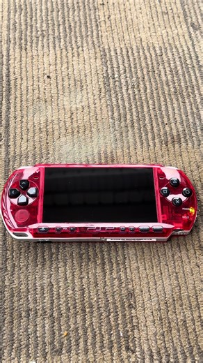 Ultimate PSP-3000 Clear Red 🔴 with Laminated IPS LCD, “Clicky” Tactile Buttons for the D-Pad, 4 Action Buttons (🟥, 🔺, ⭕️, ❌), and L/R Buttons, USB-C port for charging only (no data transfer as there’s still a mini USB on the top), wireless charging, and Bluetooth capabilities! #psp #sony #ultimate #red #clear
