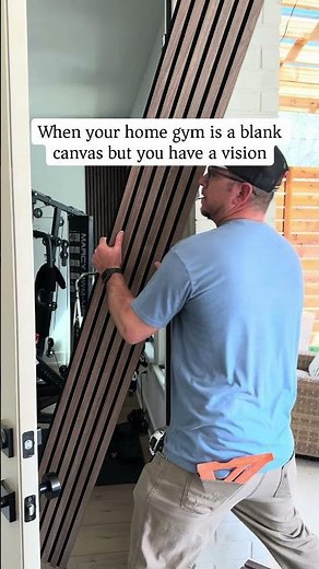 Home gym transformation with acoustic wall panels.
