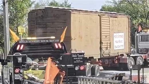Historic boxcar on the move from Huntsville to Scottsboro